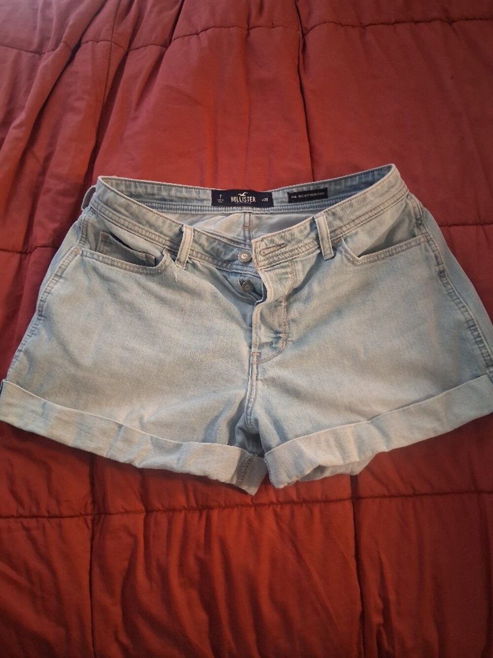 Hollister size 7 jean shorts, 5 pockets, rolled cuff, faded light blue denim